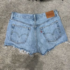 Levi’s women’s distressed jean shorts - size 28.